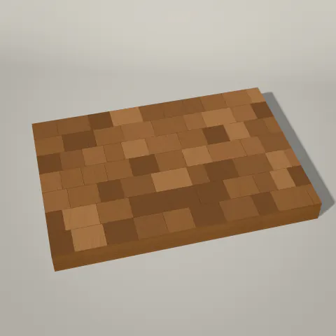 An end-grain acacia cutting board, its block pattern seen from above at an angle.